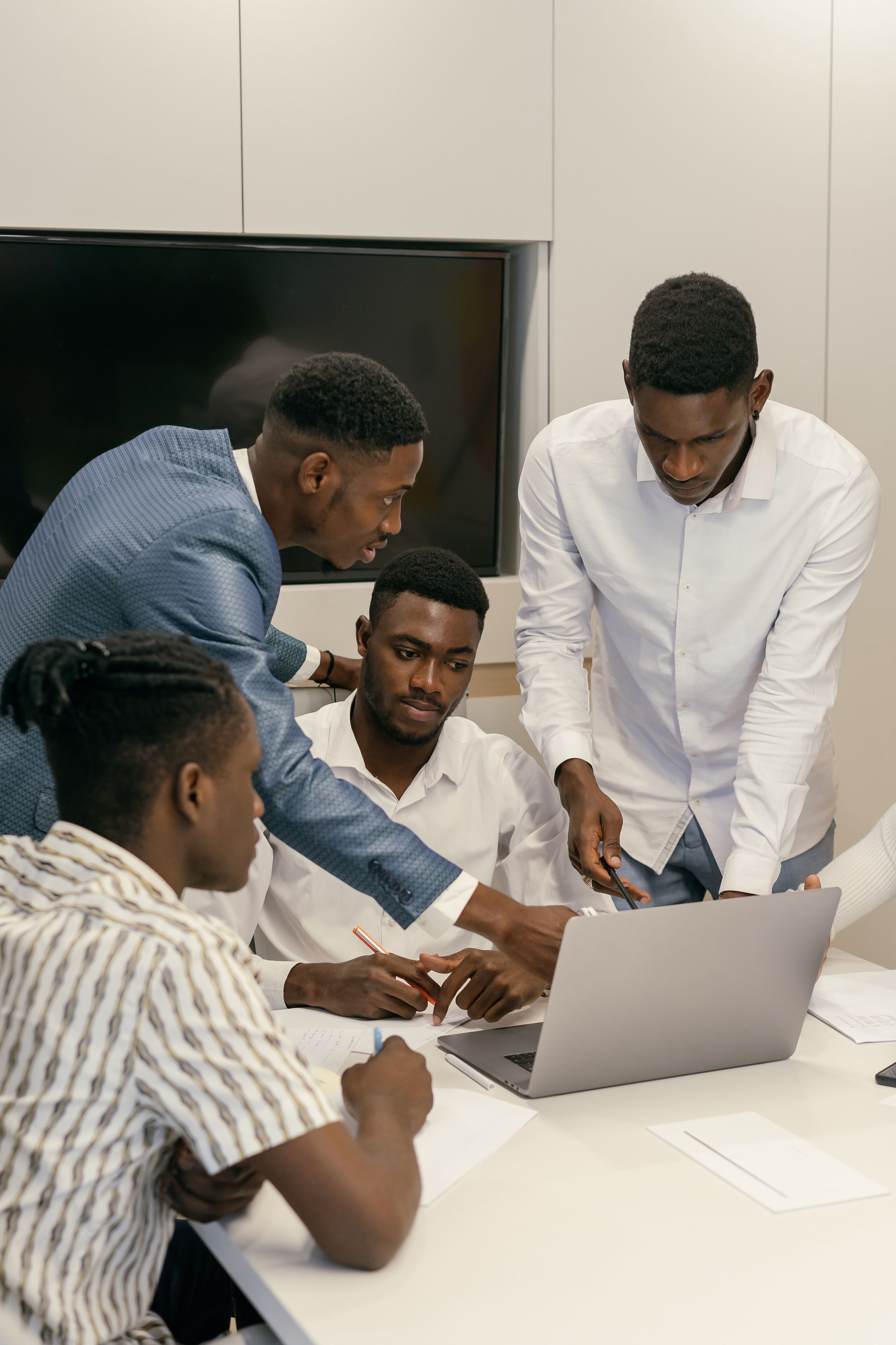 Professional business team in boardroom meeting